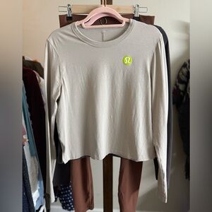 Lululemon Beige all yours long sleeve tee with logo on front and back med